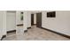 Bedroom with tile flooring, mirrored closet doors, and neutral paint at 135 James Pl, Maitland, FL 32751