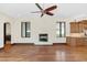 Spacious living room features hardwood floors, fireplace and bright windows at 135 James Pl, Maitland, FL 32751