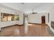 Bright and airy living room featuring hardwood floors and french doors at 135 James Pl, Maitland, FL 32751