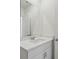 Bright bathroom featuring a vanity with a quartz countertop at 1522 Mermaid Way, Haines City, FL 33844