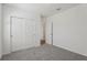 Bright bedroom with a closet and an open door to another room at 1522 Mermaid Way, Haines City, FL 33844