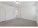 A bright bedroom with a carpet at 1522 Mermaid Way, Haines City, FL 33844
