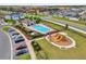 Community amenities include a swimming pool, playground, parking and landscaped green spaces for residents to enjoy at 1623 Mirabella Cir, Davenport, FL 33897