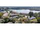Stunning aerial view of condo community by the lake, surrounded by lush greenery and convenient parking at 165 N Pearl Lake Cswy # 202, Altamonte Springs, FL 32714