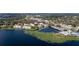 Gorgeous aerial view of the condo community situated on a picturesque lake, blending serenity and convenience at 165 N Pearl Lake Cswy # 202, Altamonte Springs, FL 32714