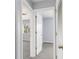 Bedroom view showcases doorways leading to other rooms, enhancing the flow and spaciousness at 165 N Pearl Lake Cswy # 202, Altamonte Springs, FL 32714