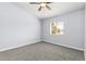 Spacious bedroom features neutral walls, plush carpeting and a ceiling fan for added comfort at 165 N Pearl Lake Cswy # 202, Altamonte Springs, FL 32714