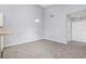 Well-lit living area with a view towards the dining area and the kitchen, offering a comfortable living space at 165 N Pearl Lake Cswy # 202, Altamonte Springs, FL 32714