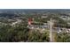 Aerial view showing the house surrounded by trees in a rural neighborhood at 16958 Sw 20Th Ct, Ocala, FL 34473