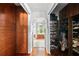 Walk-in closet with custom storage solutions, featuring shelving and hanging space at 17201 Magnolia Island Blvd, Clermont, FL 34711