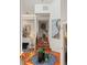Inviting foyer featuring a sculpture, wood accents, and decorative art at 17201 Magnolia Island Blvd, Clermont, FL 34711