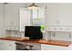 Office space with custom built-ins and a wood countertop at 17201 Magnolia Island Blvd, Clermont, FL 34711