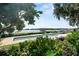 Resort-style pool area features an in-ground pool and scenic water views at 17201 Magnolia Island Blvd, Clermont, FL 34711