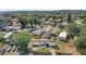 Aerial view of the home on a sprawling lot with a driveway and mature trees at 17529 Eve Dr, Montverde, FL 34756