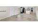 Spacious living room with modern floors and an open concept leading to the kitchen at 17529 Eve Dr, Montverde, FL 34756
