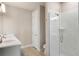 Bathroom featuring a glass enclosed shower, white cabinets and countertops and modern fixtures at 1938 Filly Trl, Oviedo, FL 32765