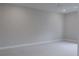 Spacious bedroom features neutral walls, white trim, and plush carpeting, creating a serene and inviting atmosphere at 1938 Filly Trl, Oviedo, FL 32765