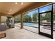 Relax on the screened lanai overlooking a sparkling pool and lush landscaping at 1938 Filly Trl, Oviedo, FL 32765