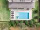 Aerial view of backyard featuring a spacious pool, jacuzzi, and lounge chairs at 1938 Filly Trl, Oviedo, FL 32765