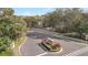 Street view of the community sign and surrounding trees and landscaping at 211 Stardale Ln, Altamonte Springs, FL 32714