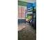A bunkbed in a colorful bedroom featuring large window providing ample sunlight at 2133 Korat Ln, Maitland, FL 32751