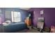 Bedroom featuring a TV, dresser, and carpeted floor at 2133 Korat Ln, Maitland, FL 32751
