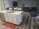 Modern kitchen with stainless steel appliances, marble countertops, and an open layout design at 2133 Korat Ln, Maitland, FL 32751