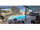 Screened in pool with seating and landscaped fenced yard at 2133 Korat Ln, Maitland, FL 32751