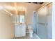 Bathroom featuring a shower, vanity, toilet, and tile flooring, offering a functional and bright space at 2439 Teton Stone Run, Orlando, FL 32828
