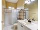 Bathroom with a shower, vanity, toilet, and tile flooring, offering a functional and clean space at 2439 Teton Stone Run, Orlando, FL 32828