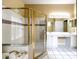 Bright bathroom featuring a tub, walk-in shower and double sinks at 2439 Teton Stone Run, Orlando, FL 32828