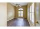 Bedroom featuring wood-look floors, a modern ceiling fan, and neutral walls, creating a serene and inviting atmosphere at 2439 Teton Stone Run, Orlando, FL 32828
