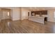Expansive open-concept living space seamlessly connecting the kitchen and living areas at 2447 Matterhorn Trl, Davenport, FL 33837