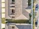 Overhead shot of townhomes displaying the roofs, yards, and the parking at 2682 Mead Ave, St Cloud, FL 34771