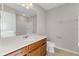 Bright bathroom with a spacious vanity and an oversized mirror at 2682 Mead Ave, St Cloud, FL 34771