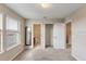 Spacious bedroom with two windows and doors leading to the bathroom and closet at 2682 Mead Ave, St Cloud, FL 34771