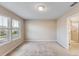 Well-lit bedroom featuring large windows and a neutral carpet at 2682 Mead Ave, St Cloud, FL 34771