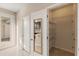 Hallway with tile flooring and a closet with shelving at 2682 Mead Ave, St Cloud, FL 34771