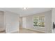 Bright, airy living room with a large window and tile flooring at 2682 Mead Ave, St Cloud, FL 34771