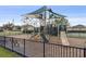 Community playground with slides, climbing structures, and shaded areas for enjoyment at 2682 Mead Ave, St Cloud, FL 34771