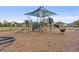 Well-equipped community playground featuring multiple slides, climbing areas, and a protective mulch surface at 2682 Mead Ave, St Cloud, FL 34771