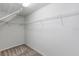 Spacious walk-in closet with wire shelving for organized storage at 2682 Mead Ave, St Cloud, FL 34771