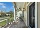 Covered front porch with brick flooring and view of the neighborhood at 2875 Stanfield Ave, Orlando, FL 32814