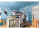 Whimsical ' room with cloud-painted walls and an innovative bunk bed design at 302 Vista Loop, Davenport, FL 33897