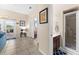 Hallway featuring access to the backyard, a bathroom, and a bedroom at 302 Vista Loop, Davenport, FL 33897