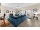 Spacious living room featuring tiled floors and access to an outdoor patio at 302 Vista Loop, Davenport, FL 33897