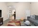 Open-concept living area with arched doorways and natural lighting at 302 Vista Loop, Davenport, FL 33897