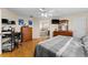 Main bedroom featuring hardwood floors, lots of natural light and a bathroom ensuite at 302 Vista Loop, Davenport, FL 33897