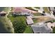 Aerial view of the property highlighting its lakeside location and surrounding landscape at 3045 Cecelia Dr, Apopka, FL 32703