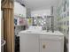 Laundry room with a white washing machine and dryer at 3212 Indian Dr, Belle Isle, FL 32812